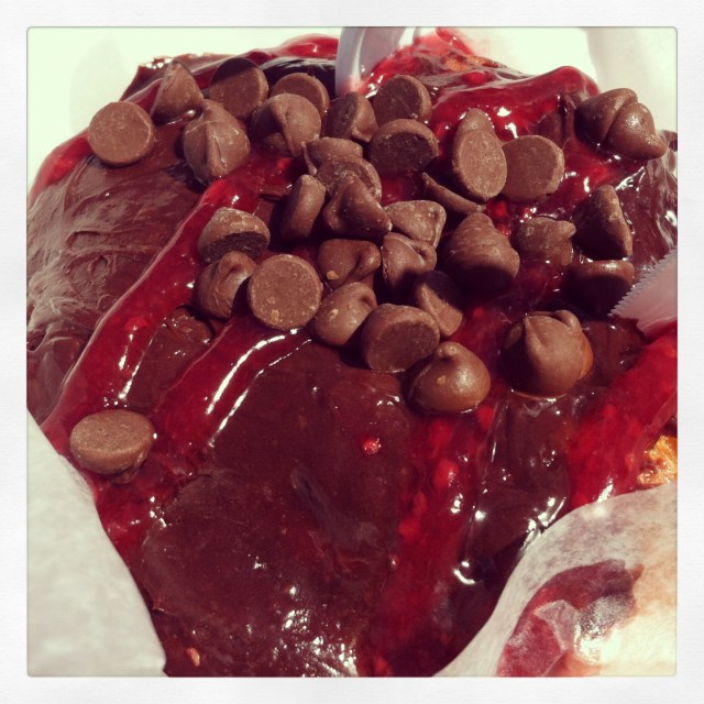 The Razzle Dazzle:  Rasberry Filling with Chocolate Fudge Icing  http://www.gourdoughs.com/