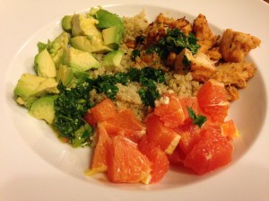Chicken, quinoa, avocado and oranges 