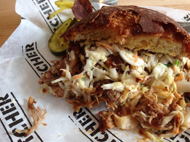 Pulled pork sandwich from Cochon Butcher. Delicious. I also had a side of Brussels sprouts and mac 'n cheese.