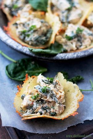 Spinach artichoke dip in Parmesan cups 
