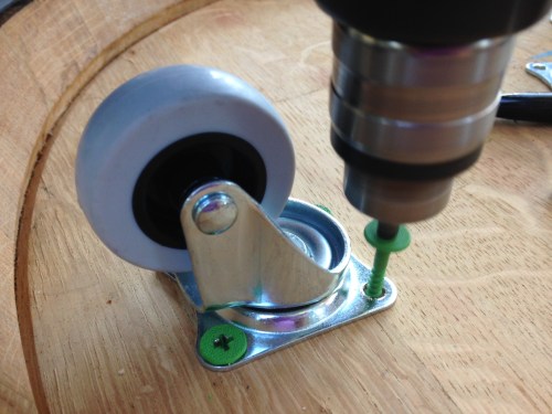 Three 2" wheels, screwed directly into the barrel