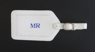 We like to travel, maybe this leather luggage tag? 