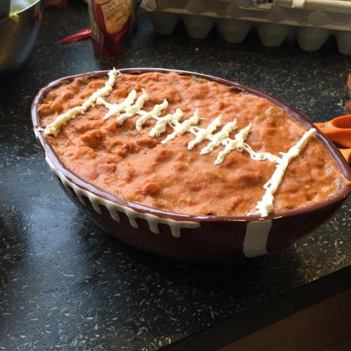 Football bean dip with sour cream laces! 