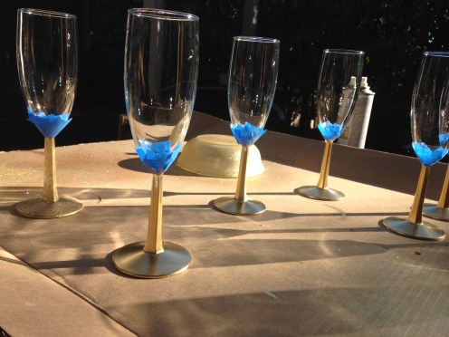 Half painted golden champagne glasses