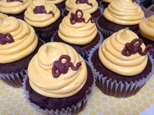Handmade chocolate bees on cupcakes