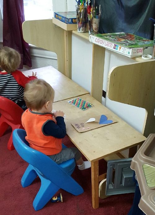 Michael working on his valentine mailbox