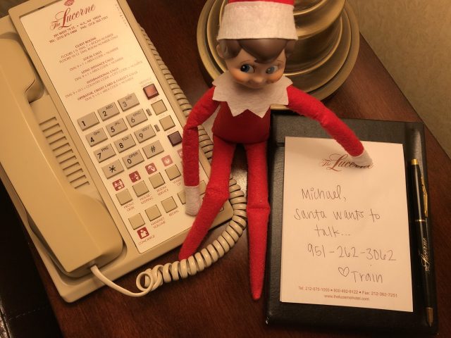 Elf on the Shelf calling Santa
